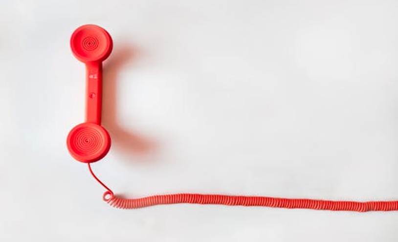 Free Red Corded Telephone on White Suraface Stock Photo